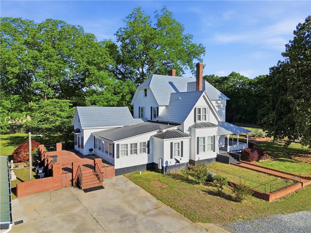 880 Johnstonville Road Barnesville, GA 30204 - Photo 27 of 33 an aerial view of a house with garden