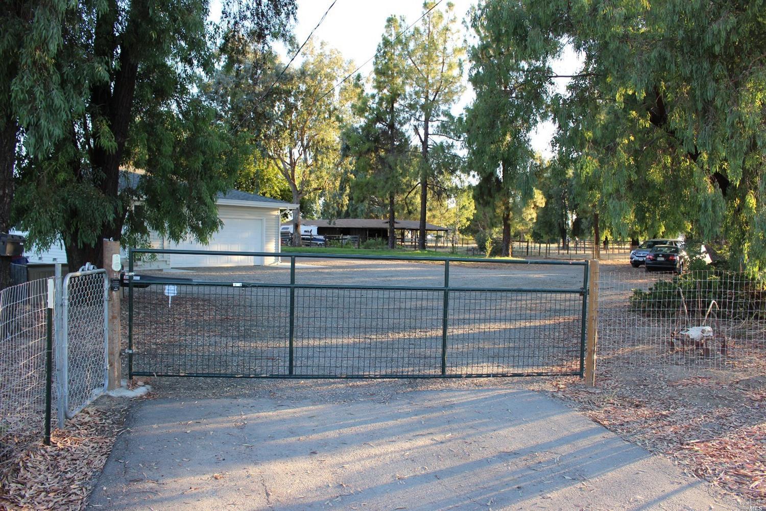 4778 Cole Road Vacaville, CA 95688 - Photo 1 of 1 Nice motorized gate greets you at the property located at the dead end of Cole Rd.