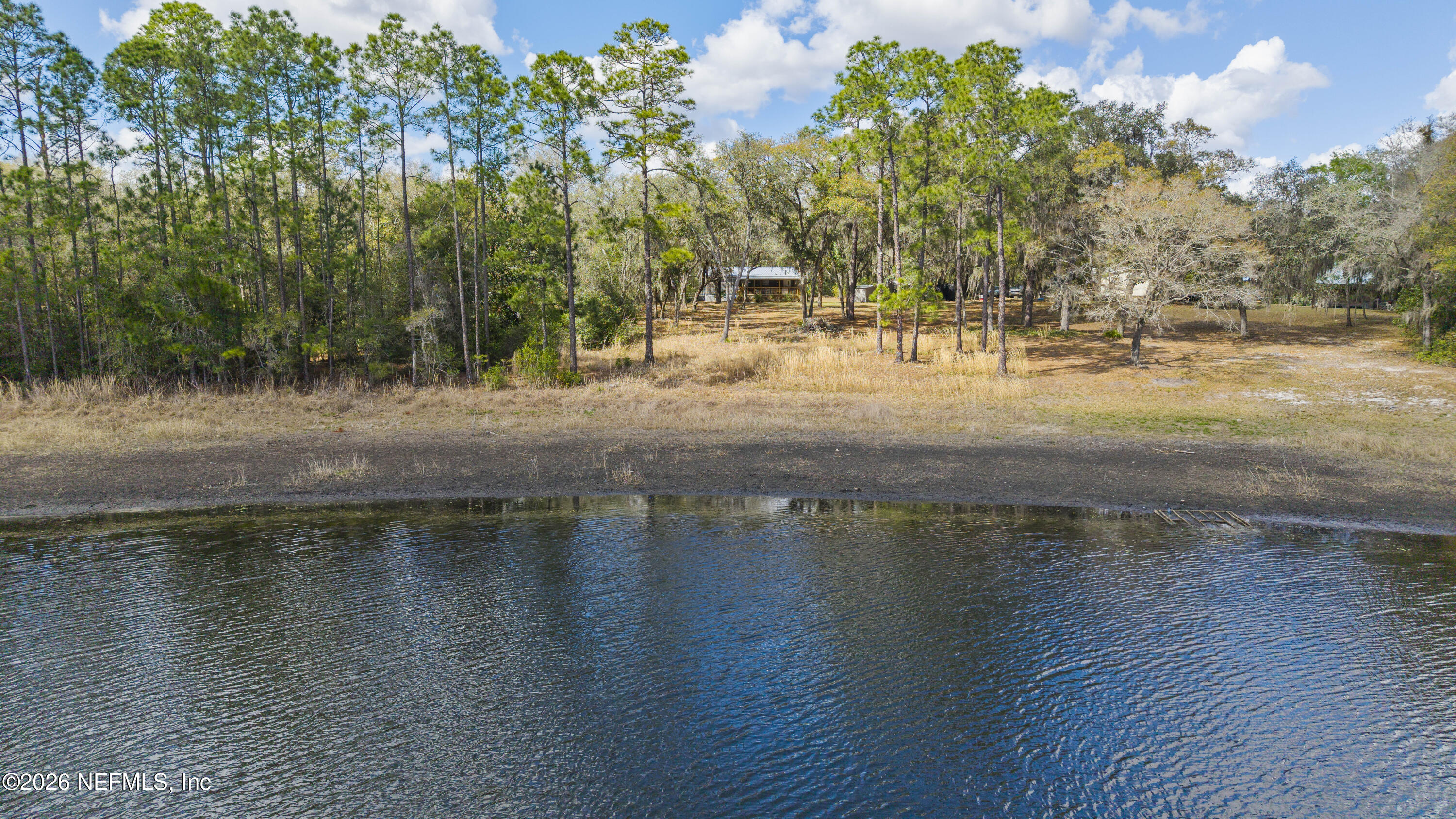 167 West Strickland Road Interlachen, FL 32148 - Photo 27 of 59 a view of a lake with houses