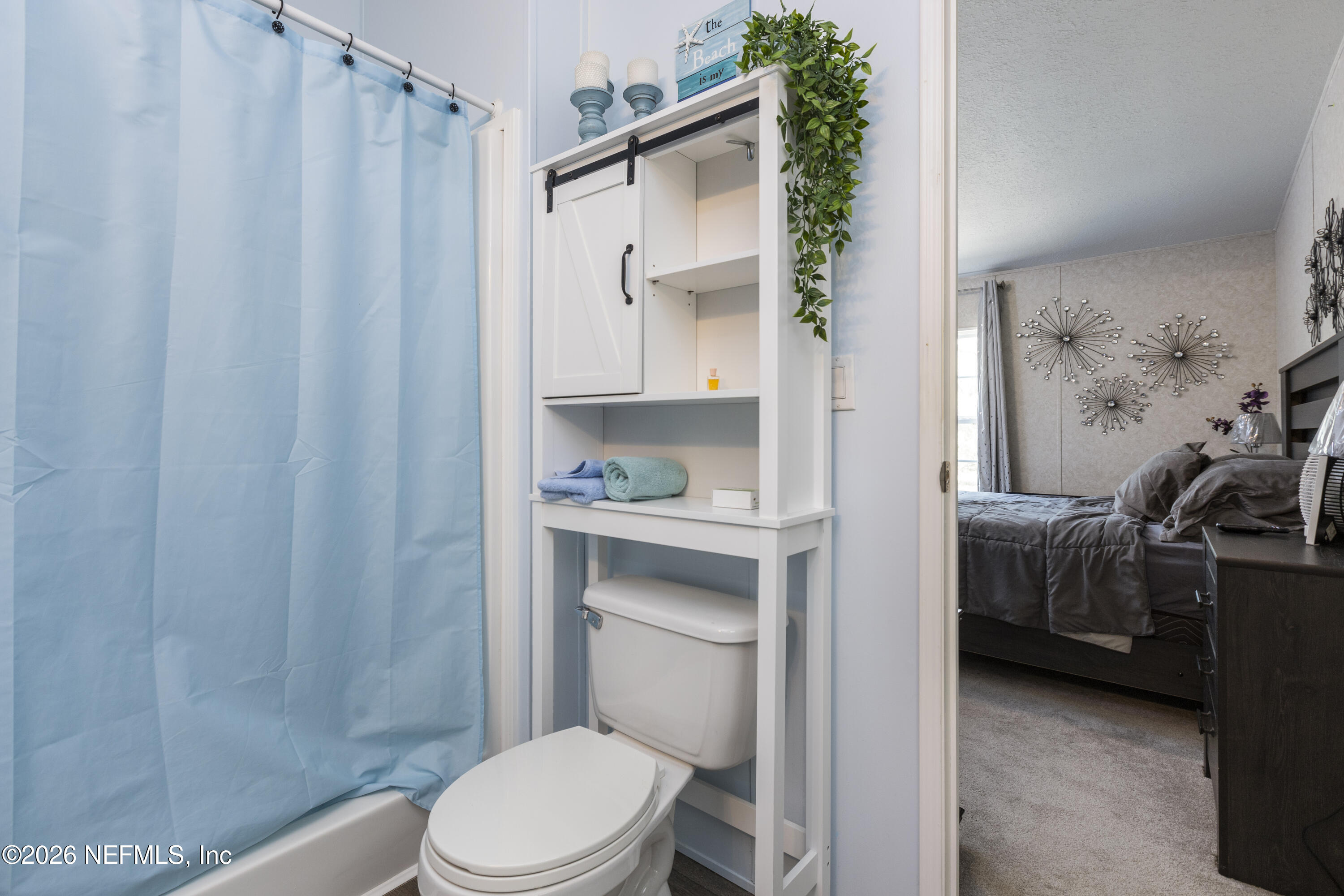 167 West Strickland Road Interlachen, FL 32148 - Photo 39 of 59 a bathroom with a sink toilet and shower