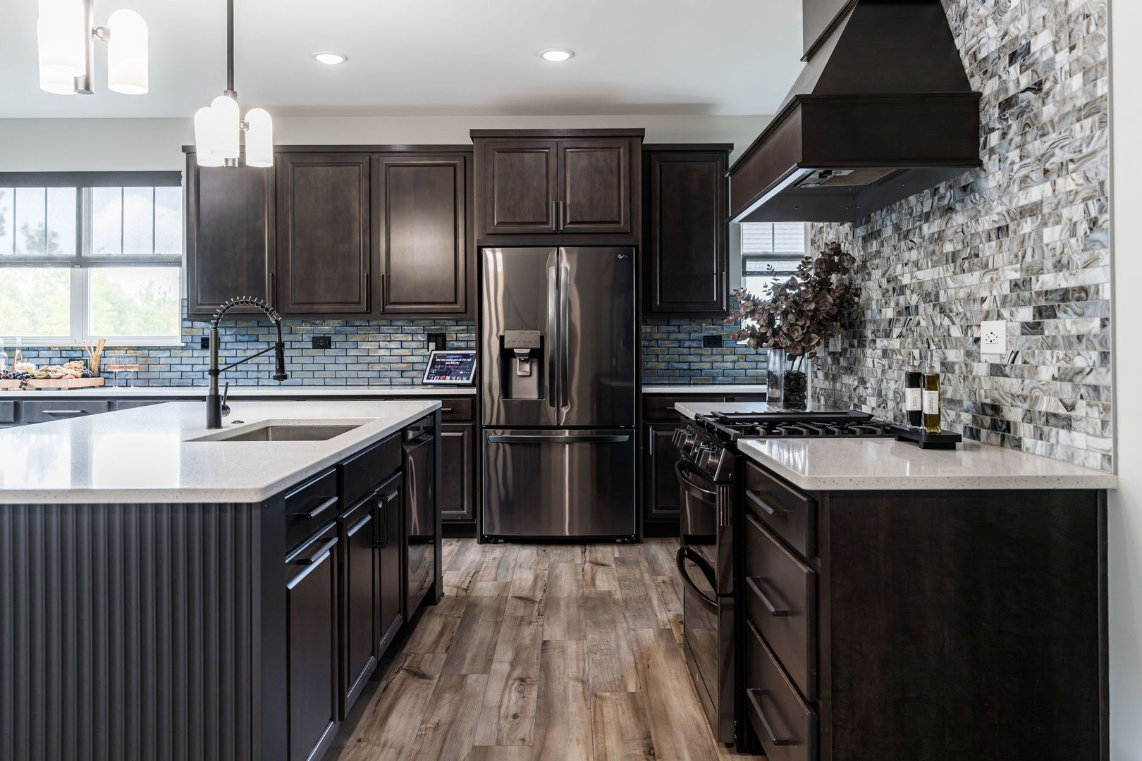 16230 Lake View Road Plainfield, IL 60586 - Photo 15 of 62 a kitchen with stainless steel appliances granite countertop a sink a stove and a refrigerator