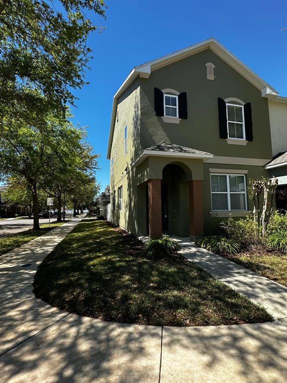 a front view of a house with a yard