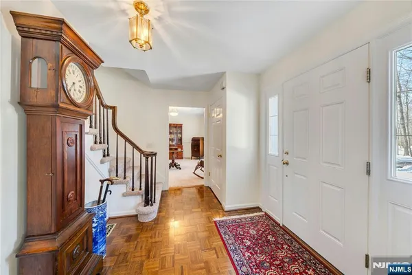 a view of an entryway with a workspace