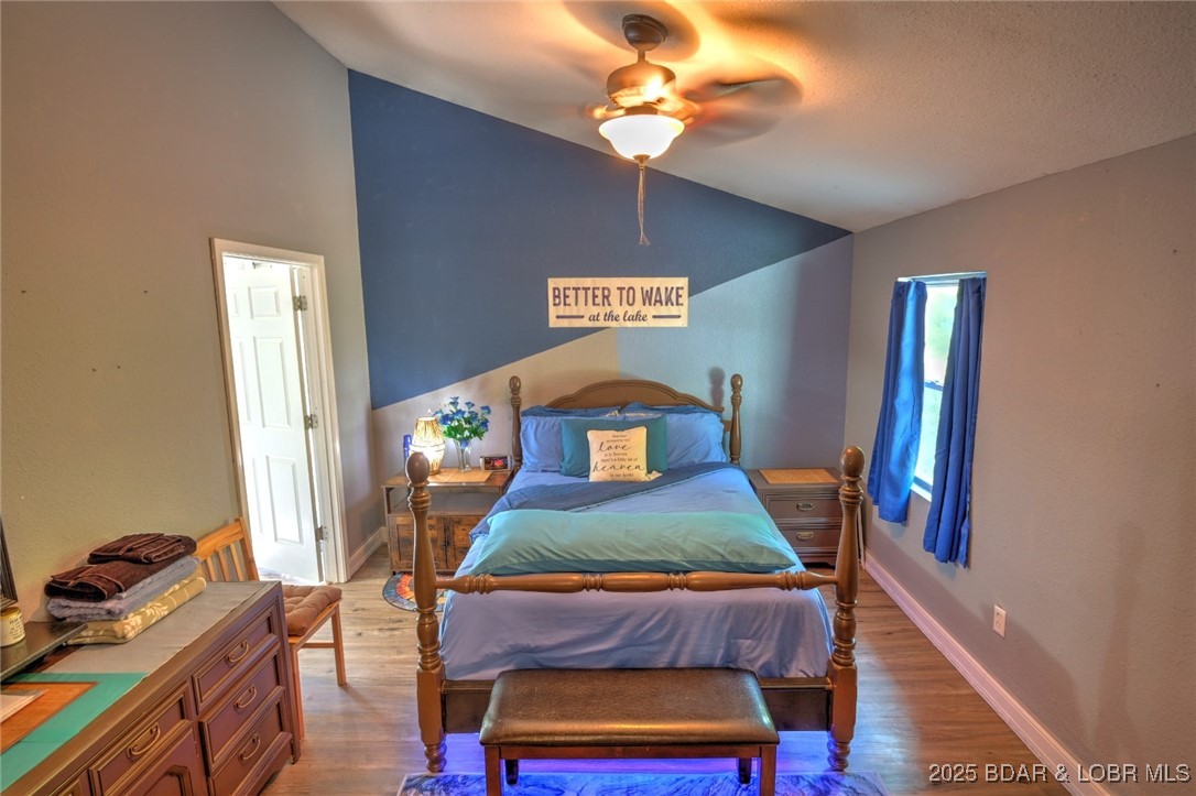 736 Everly Loop Camdenton, MO 65020 - Photo 11 of 28 Primary bedroom on main level