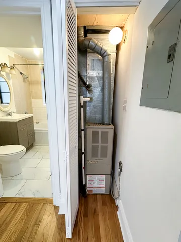 a bathroom with a tub and shower