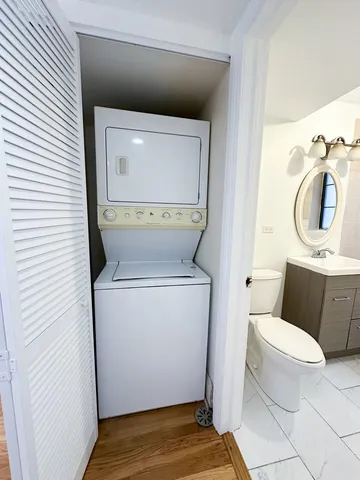 a bathroom with a toilet and a sink