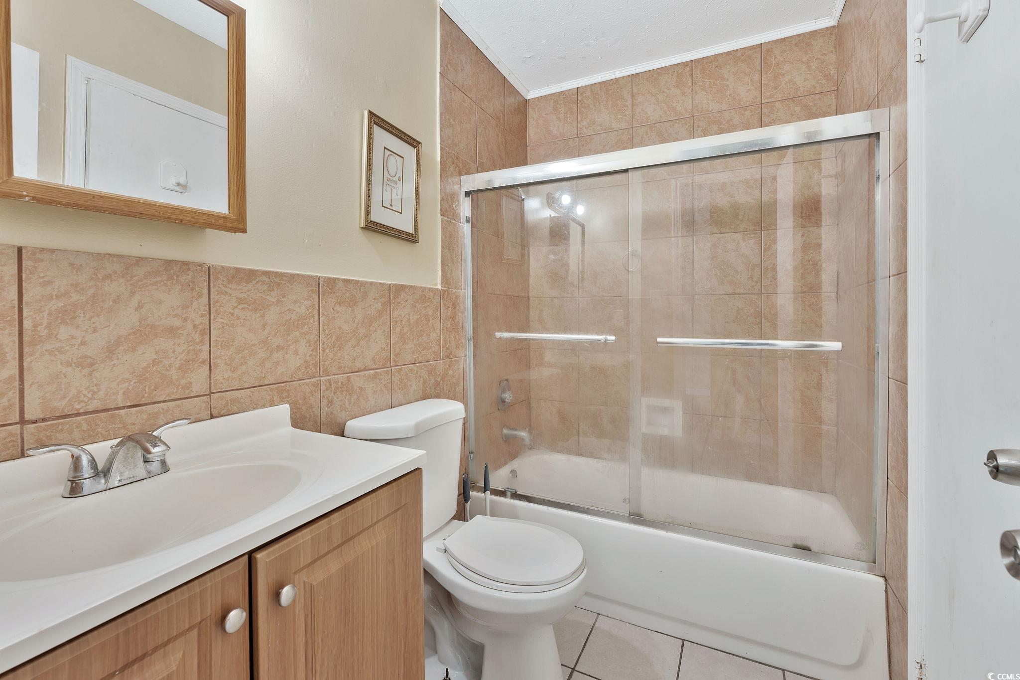 209 Cedar Street, Unit C7 Myrtle Beach, SC 29577 - Photo 13 of 13 Full bathroom with vanity, shower / bath combinati