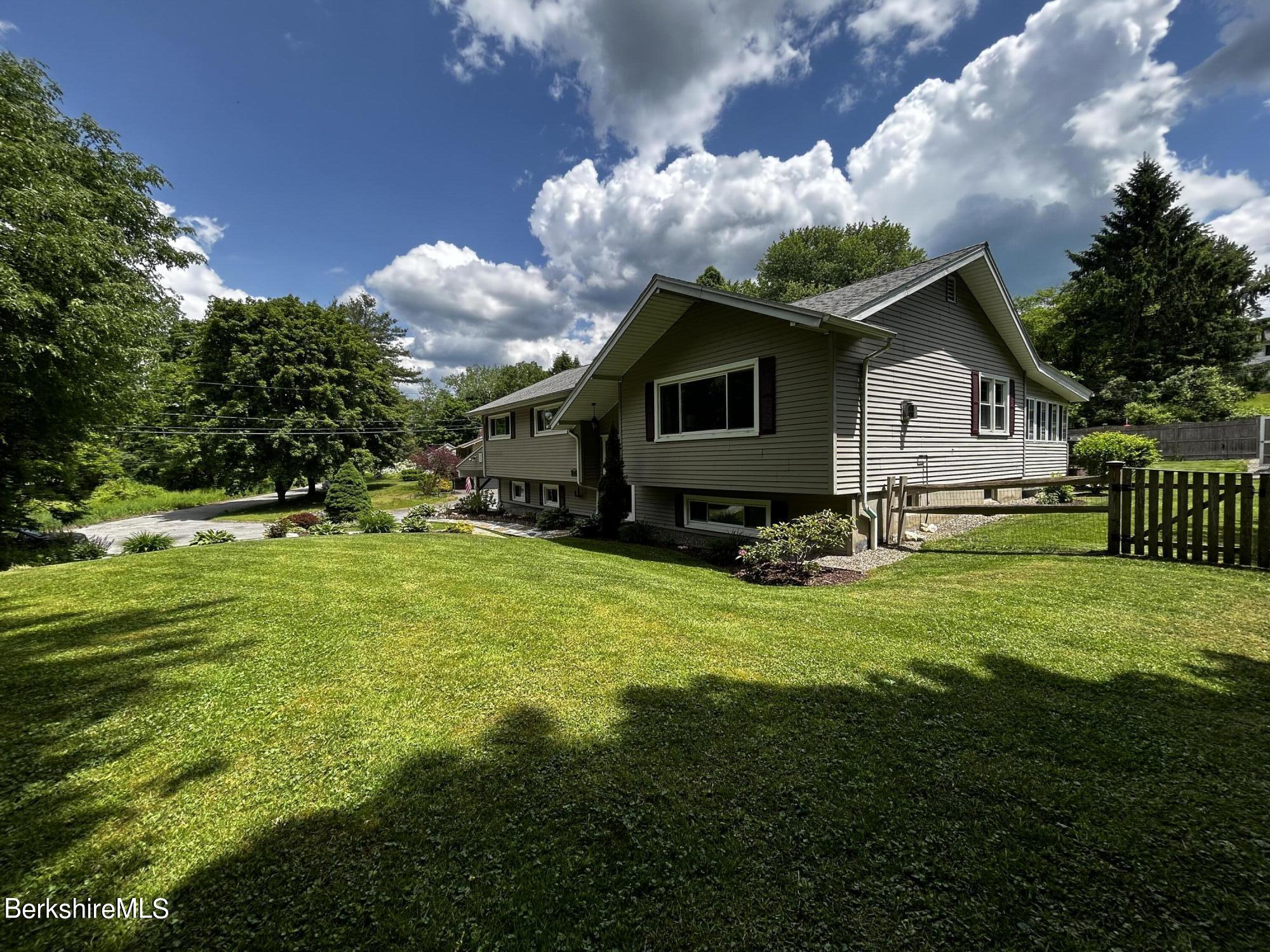 4 Devonshire Drive Cheshire, MA 01225 - Photo 41 of 48 a front view of house with yard and green space