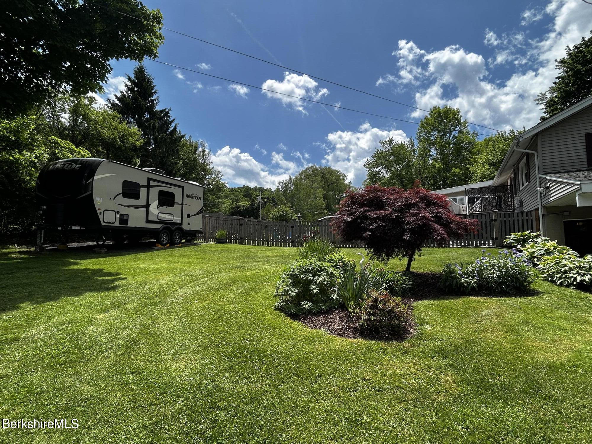 4 Devonshire Drive Cheshire, MA 01225 - Photo 45 of 48 a view of a house with a big yard plants and large trees