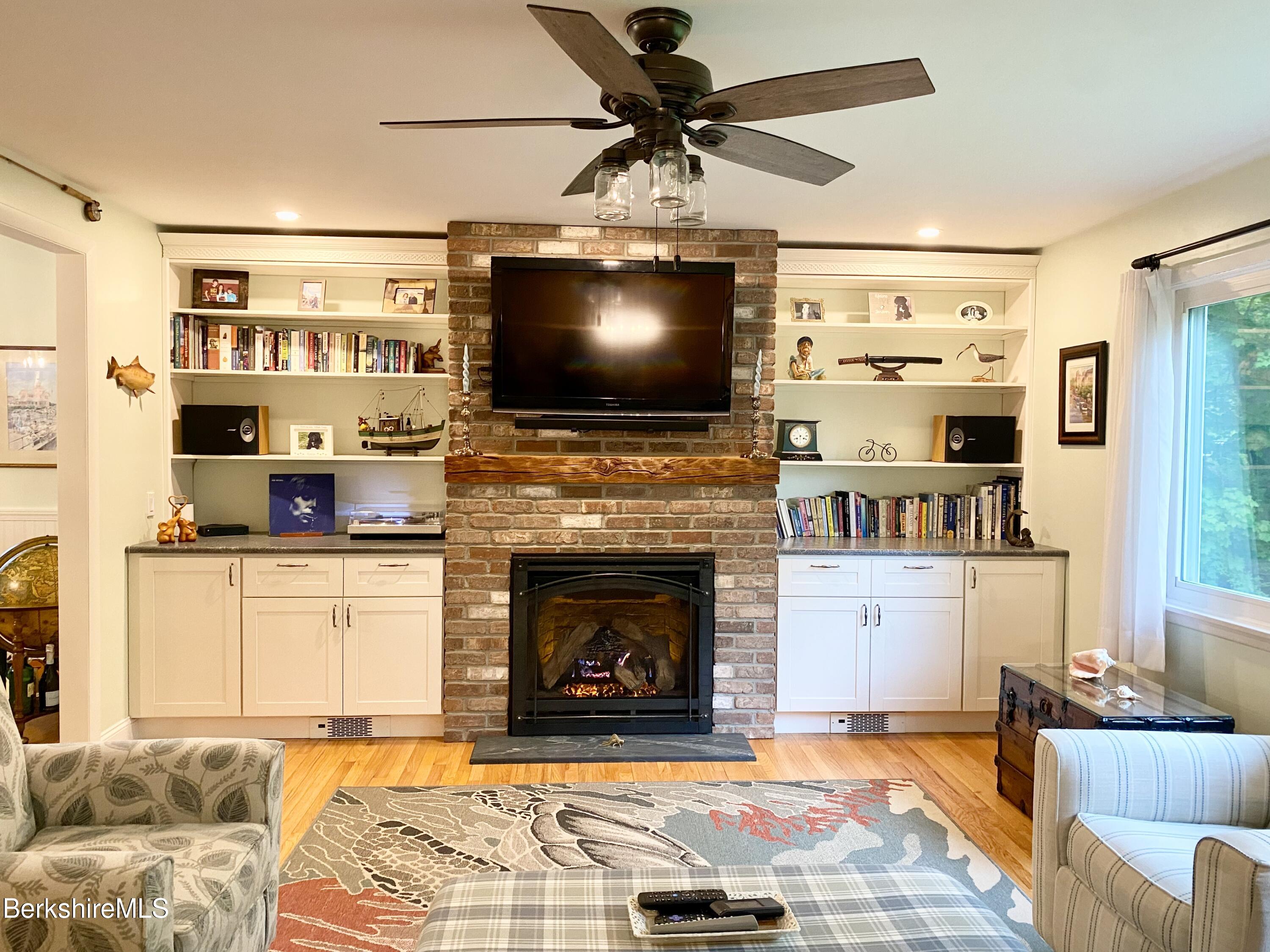 4 Devonshire Drive Cheshire, MA 01225 - Photo 7 of 48 a living room with furniture and a flat screen tv