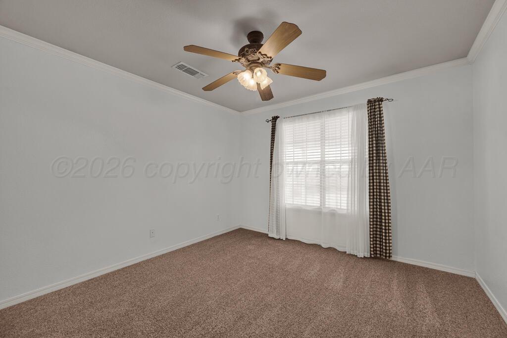 19933 Indian Spring Trail Bushland, TX 79124 - Photo 23 of 32 an empty room with windows and fan