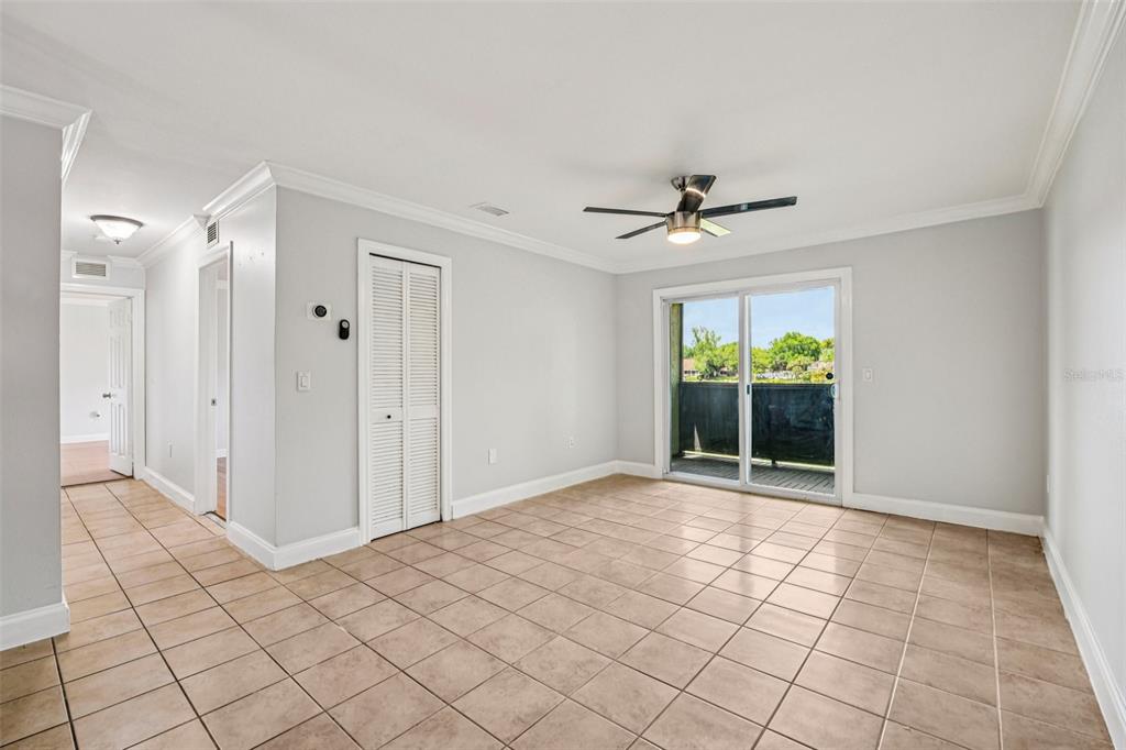 926 Lake Destiny Road, Unit F Altamonte Springs, FL 32714 - Photo 6 of 20 a view of an empty room with a window
