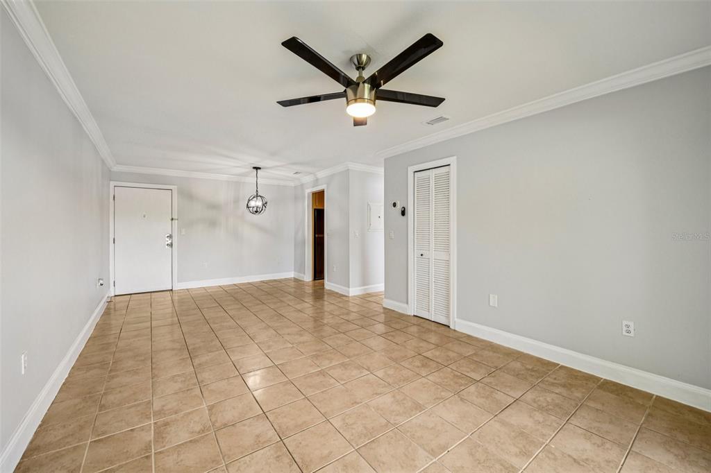 926 Lake Destiny Road, Unit F Altamonte Springs, FL 32714 - Photo 7 of 20 a very nice looking hallway with a ceiling fan