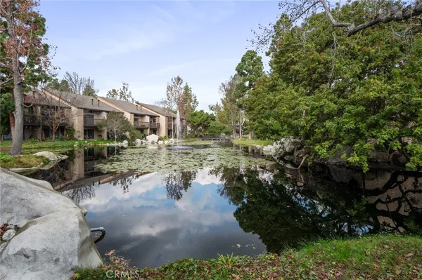 a view of a lake with a house