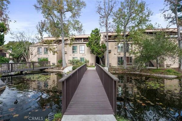 a house with river in front of it