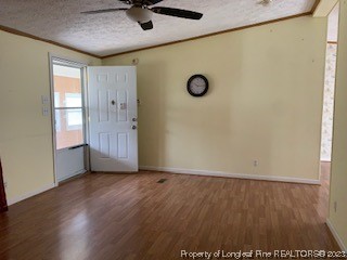 108 McIver Road Raeford, NC 28376 - Photo 29 of 40 an empty room with wooden floor door