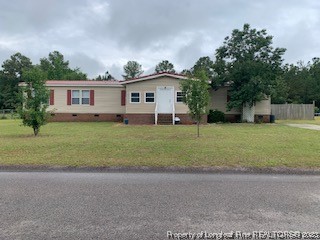108 McIver Road Raeford, NC 28376 - Photo 3 of 40 a front view of house with yard and green space