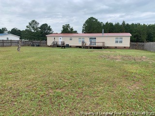 108 McIver Road Raeford, NC 28376 - Photo 35 of 40 a view of a house with a yard