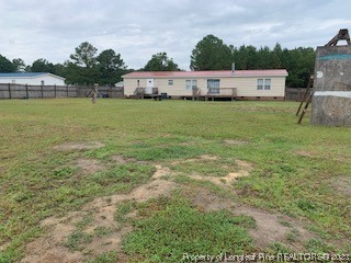 108 McIver Road Raeford, NC 28376 - Photo 36 of 40 a view of a terrace with a lake view