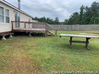 108 McIver Road Raeford, NC 28376 - Photo 37 of 40 a view of a back yard with a bench