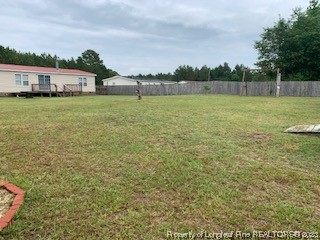 108 McIver Road Raeford, NC 28376 - Photo 40 of 40 a view of a house with a yard and sitting area