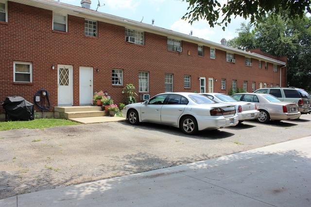 1178 Nantucket Road Aurora, IL 60506 - Photo 4 of 24 a view of a car parked in front of a brick house