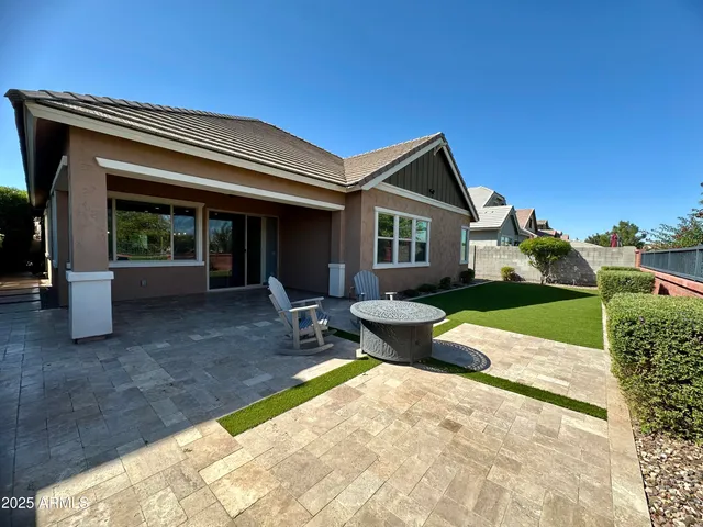 a view of a chairs and table on the deck
