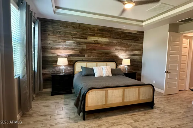 a bedroom with a bed and a cabinets