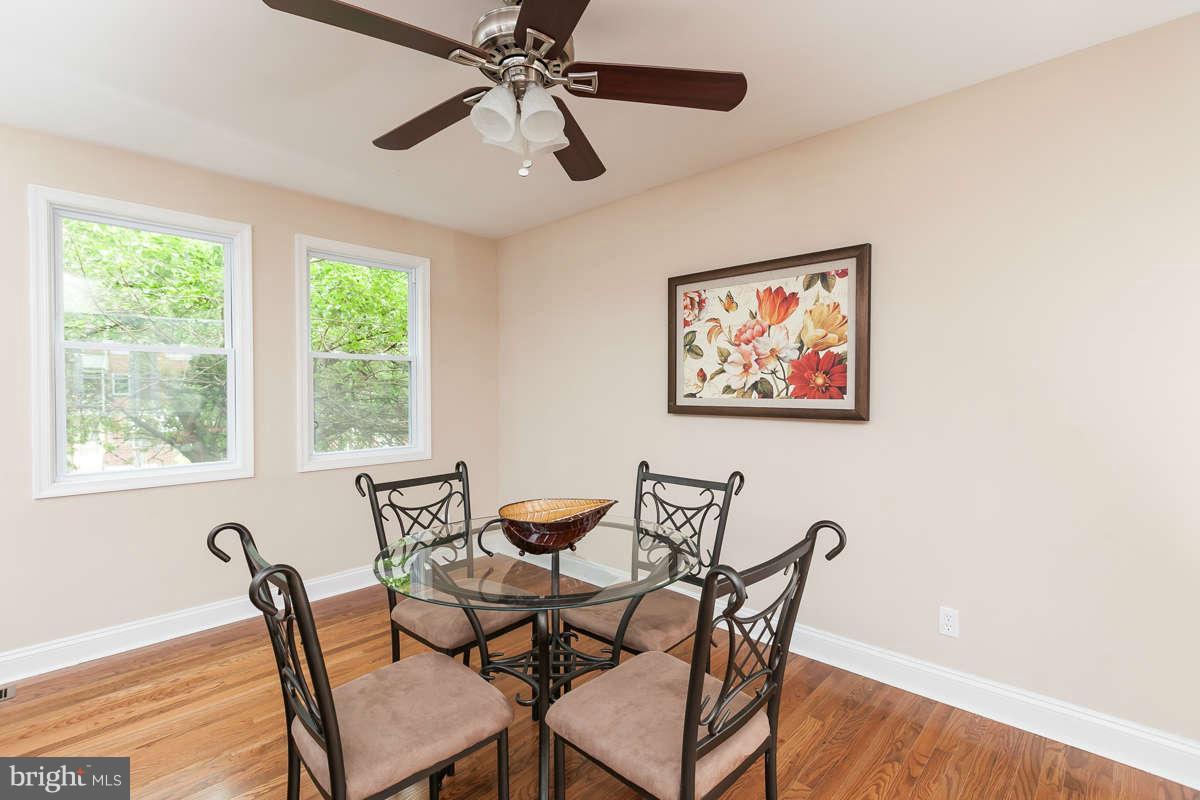 1554 Stonewood Road Baltimore, MD 21239 - Photo 11 of 30 Dining Room with hardwood floors