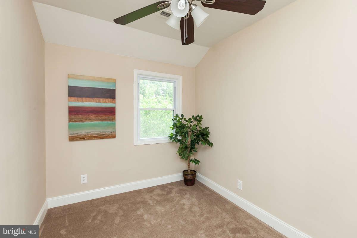 1554 Stonewood Road Baltimore, MD 21239 - Photo 18 of 30 Bedroom with new carpet