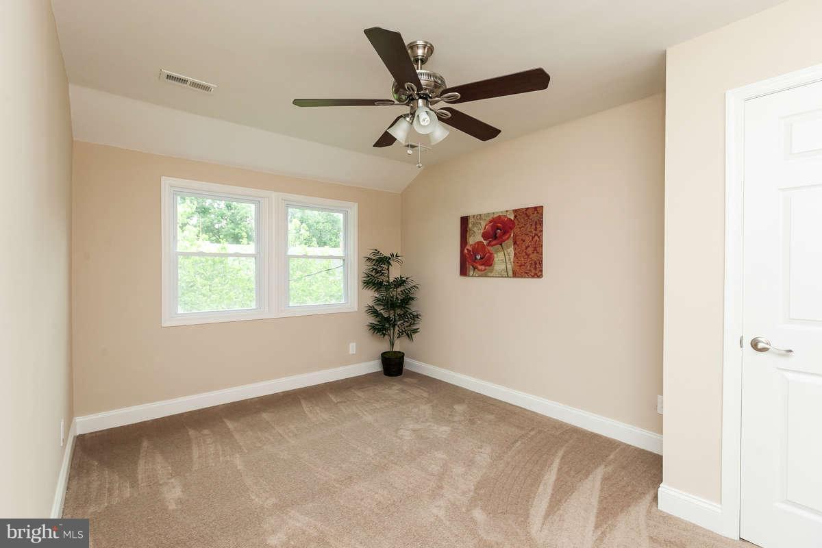 1554 Stonewood Road Baltimore, MD 21239 - Photo 20 of 30 Third bedroom