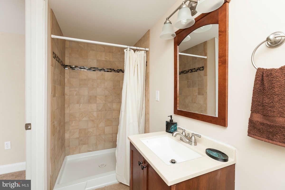 1554 Stonewood Road Baltimore, MD 21239 - Photo 26 of 30 Basement Full Bath