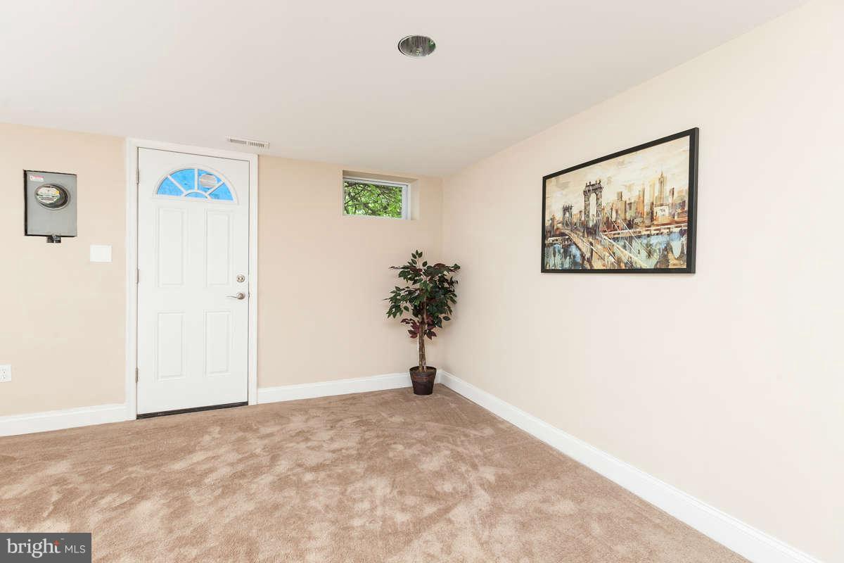 1554 Stonewood Road Baltimore, MD 21239 - Photo 27 of 30 Outside entrance to basement