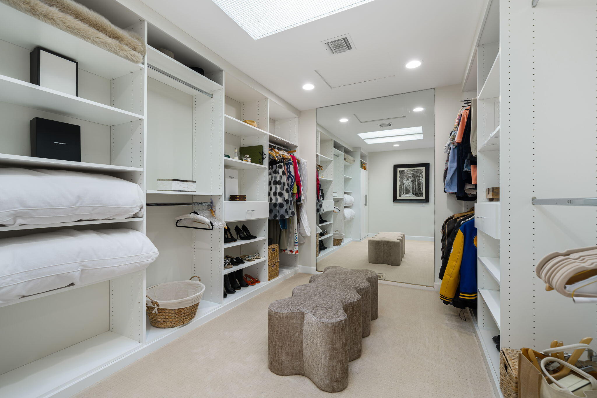 6 Exeter Court Rancho Mirage, CA 92270 - Photo 38 of 54 a view of walk in closet with clothes and shoes