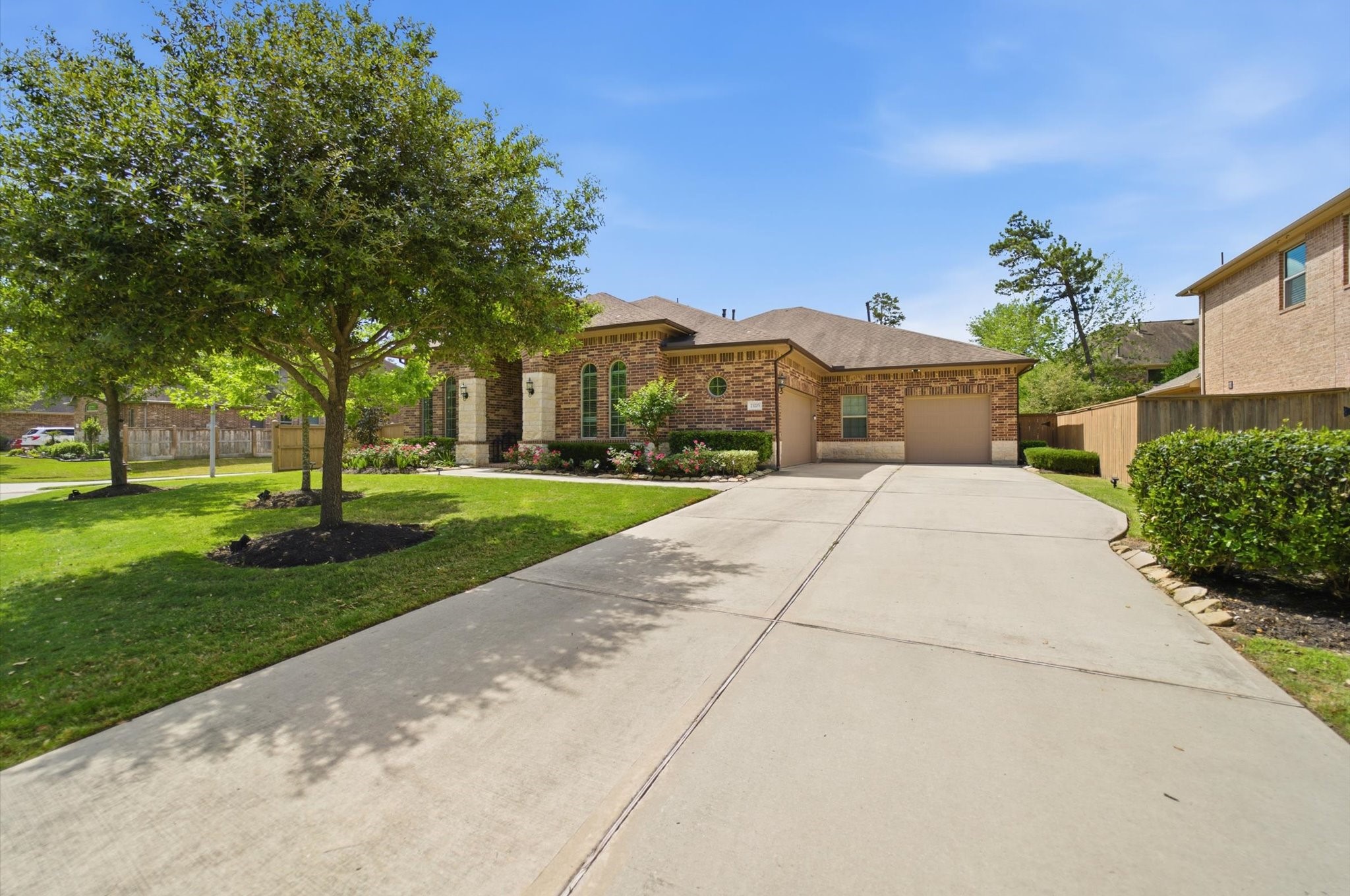 23203 Morning Dove Bend Lane Spring, TX 77389 - Photo 5 of 48 Wide driveway with 3 car garage.