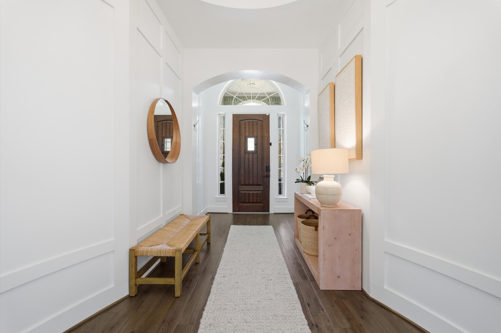 23203 Morning Dove Bend Lane Spring, TX 77389 - Photo 6 of 48 Beautiful wood paneling on both sides of the entryway and high ceilings.