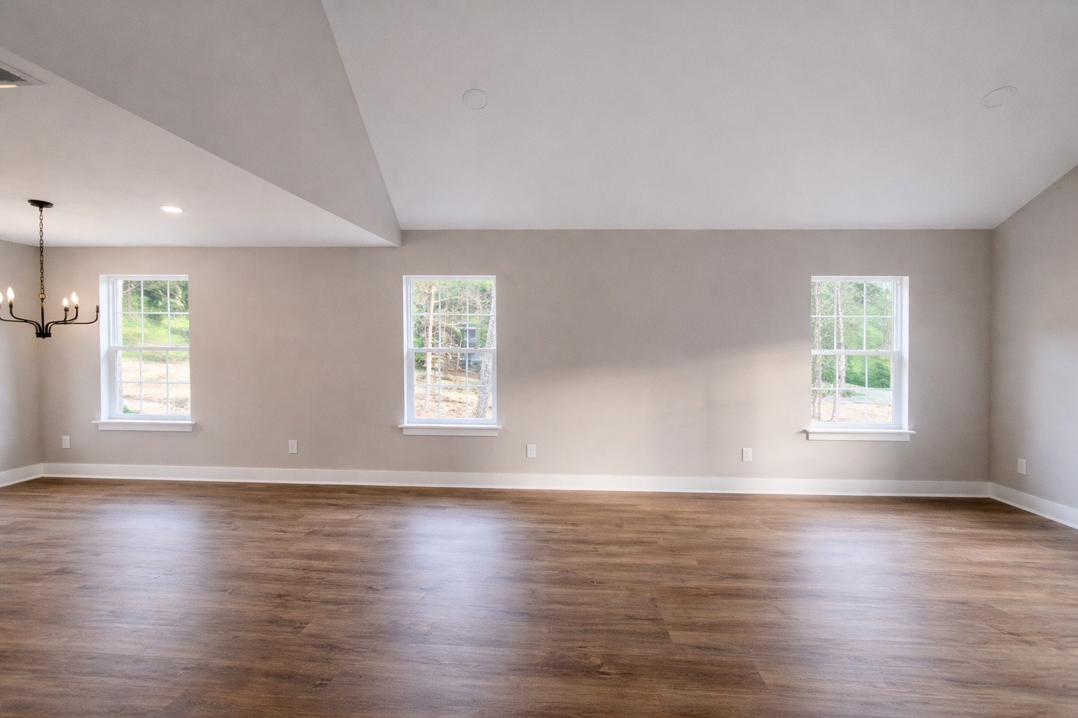4619 Chapel Hill Road Southside, TN 37171 - Photo 14 of 28 an empty room with wooden floor and windows