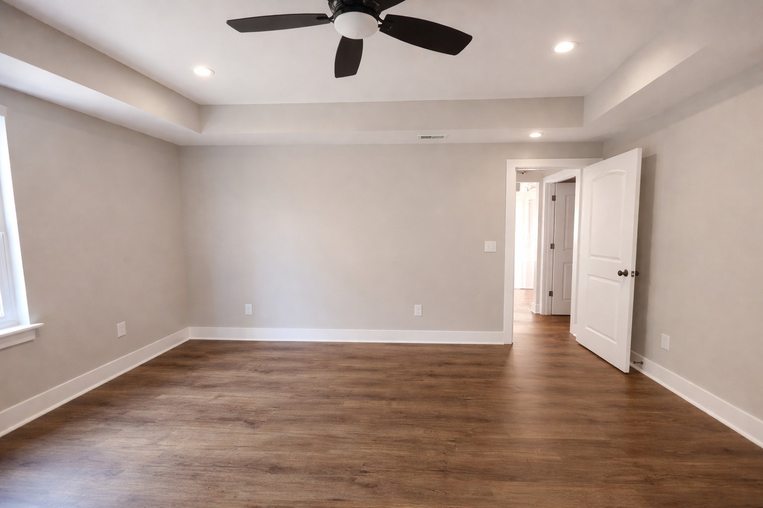 4619 Chapel Hill Road Southside, TN 37171 - Photo 15 of 28 an empty room with wooden floor and windows