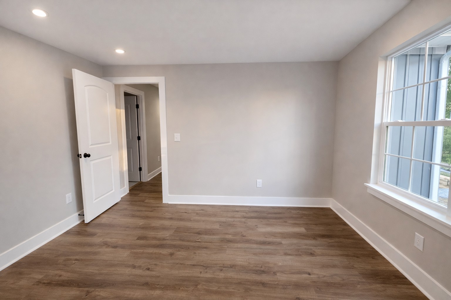 4619 Chapel Hill Road Southside, TN 37171 - Photo 18 of 28 wooden floor in an empty room with a window