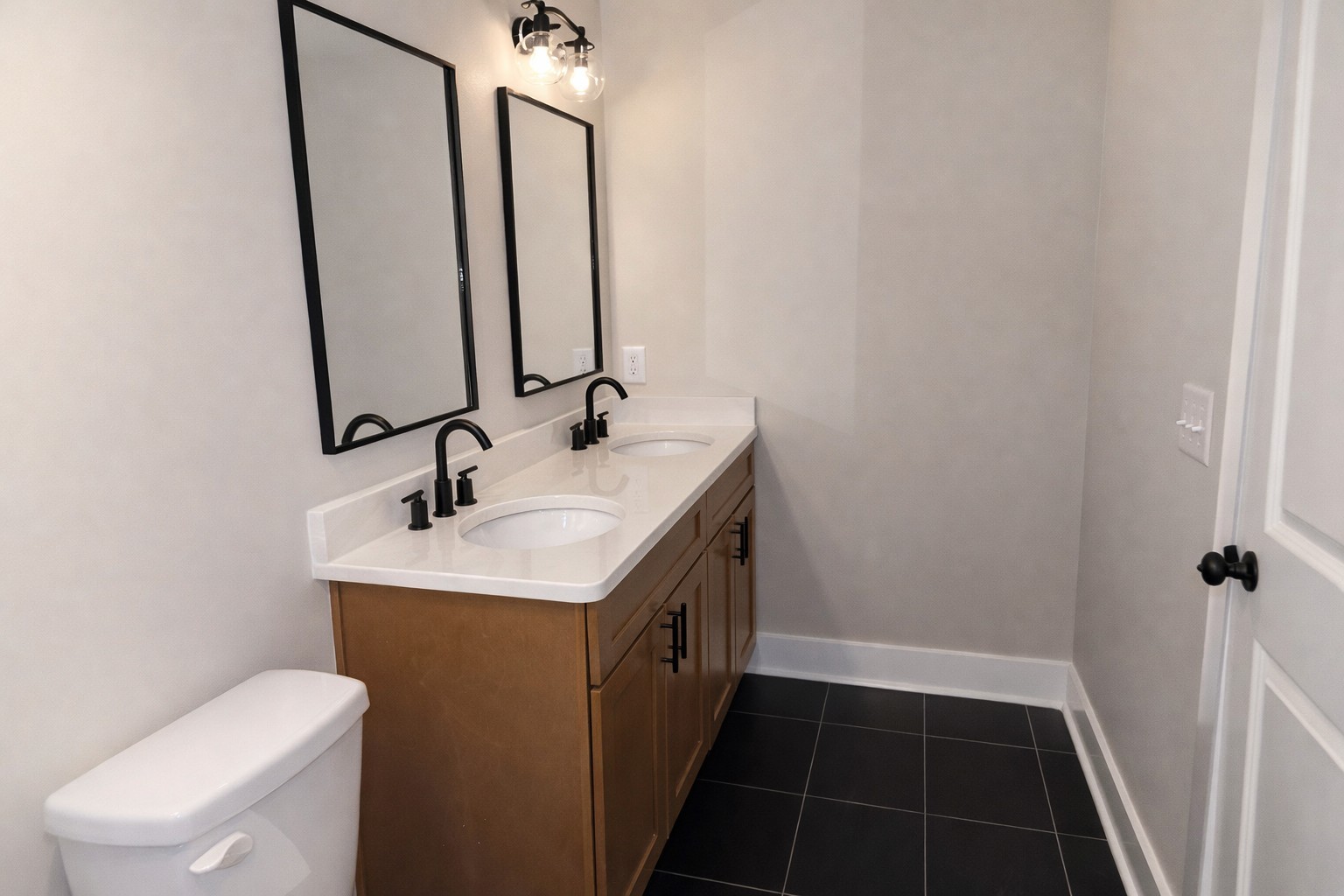 4619 Chapel Hill Road Southside, TN 37171 - Photo 19 of 28 a bathroom with a double vanity sink a toilet and a mirror