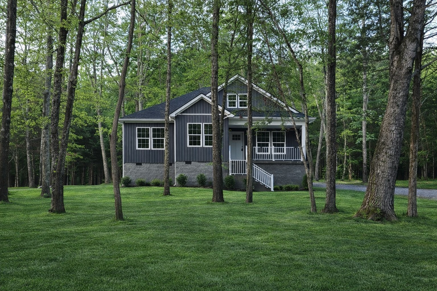 4619 Chapel Hill Road Southside, TN 37171 - Photo 2 of 28 a front view of a house with a yard