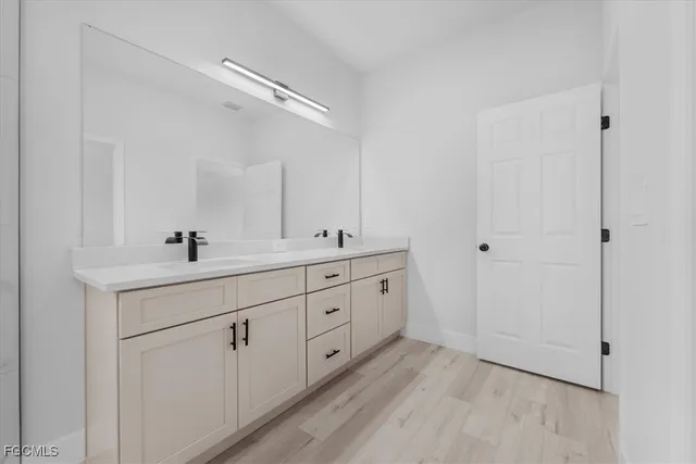 a view of an empty room and a window