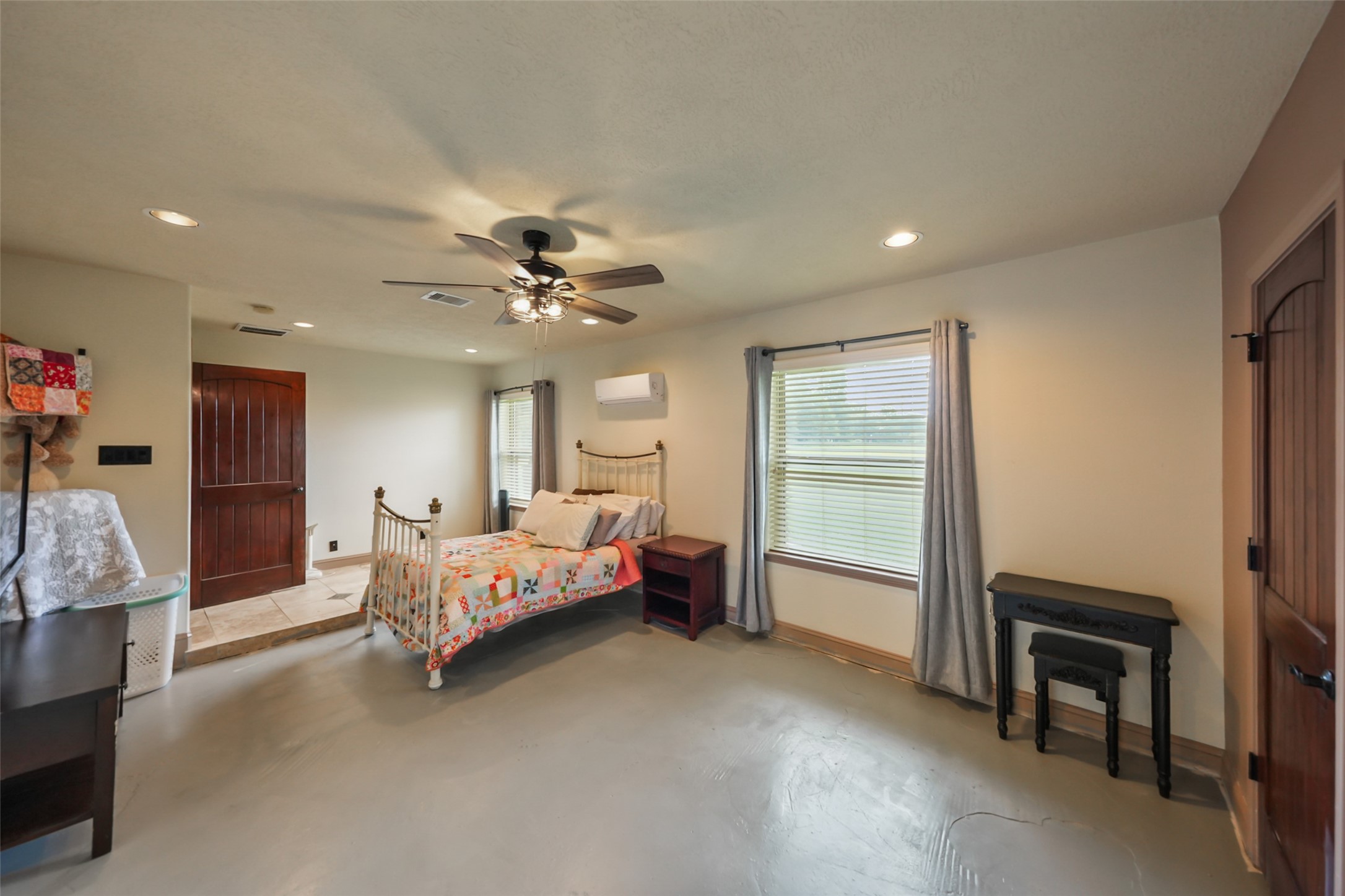 34366 Owens Road Hempstead, TX 77445 - Photo 18 of 46 Spacious secondary bedroom with neutral finishes, abundant natural light, generous closet space, and flexible room for family, guests, or a home office.