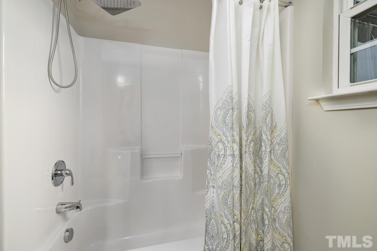 1205 Lombar Street Raleigh, NC 27610 - Photo 28 of 31 a bathroom with a shower