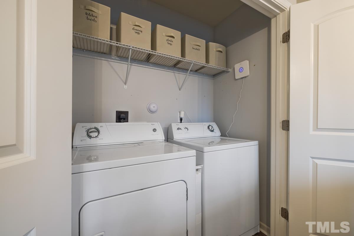 1205 Lombar Street Raleigh, NC 27610 - Photo 29 of 31 a utility room with dryer and washer