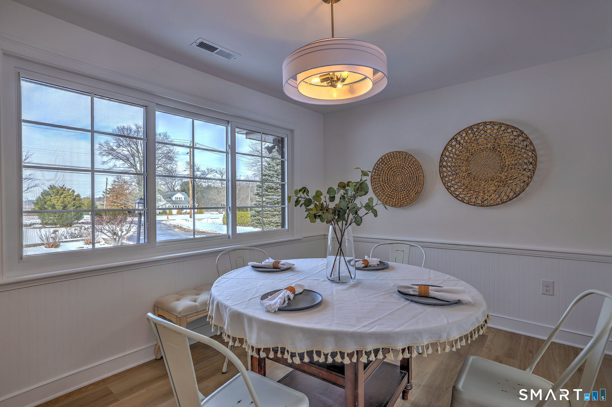 53 Geer Street Cromwell, CT 06416 - Photo 12 of 40 a view of a dining room with furniture window and chandelier