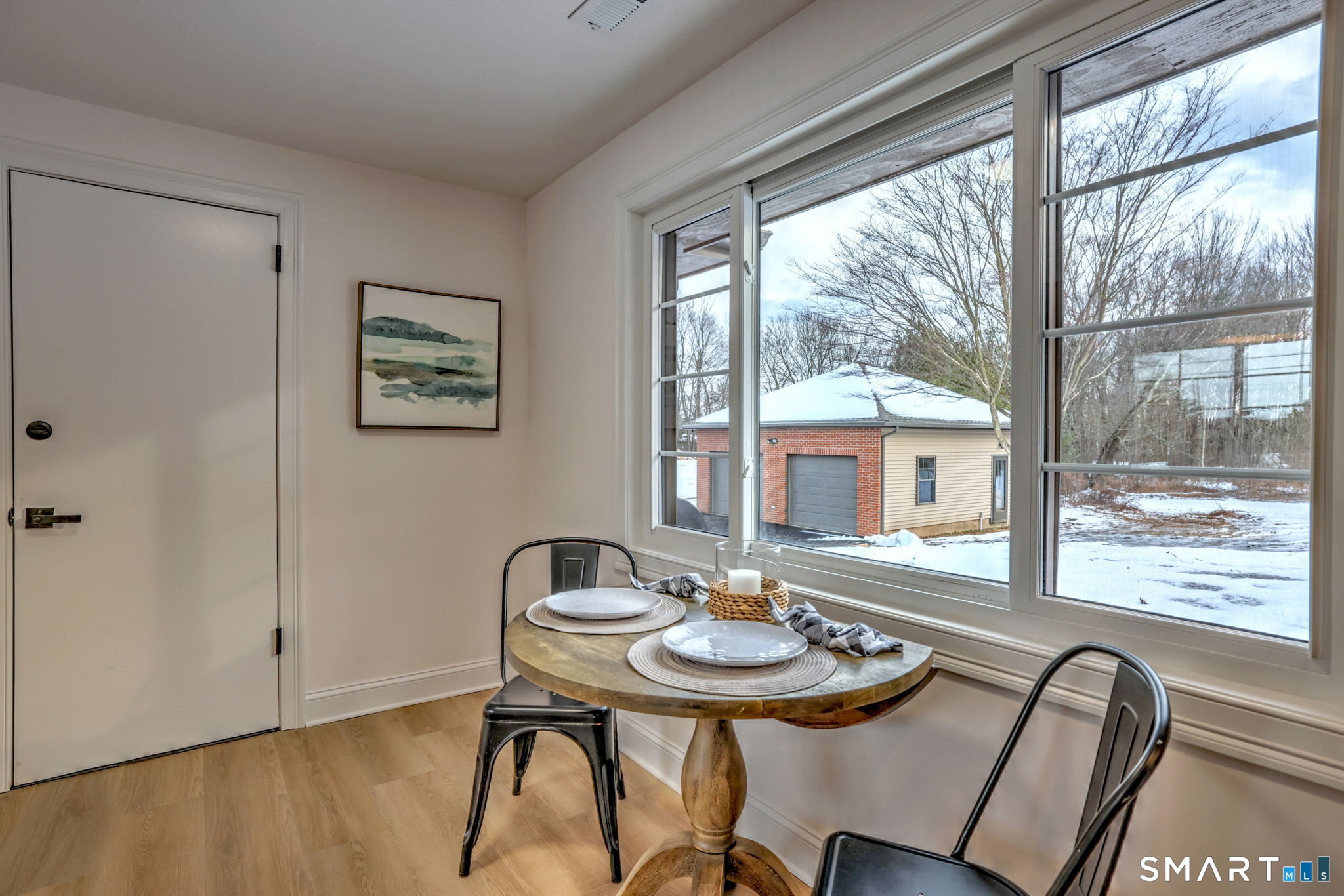 53 Geer Street Cromwell, CT 06416 - Photo 29 of 44 a view of a dining room with furniture window and outside view