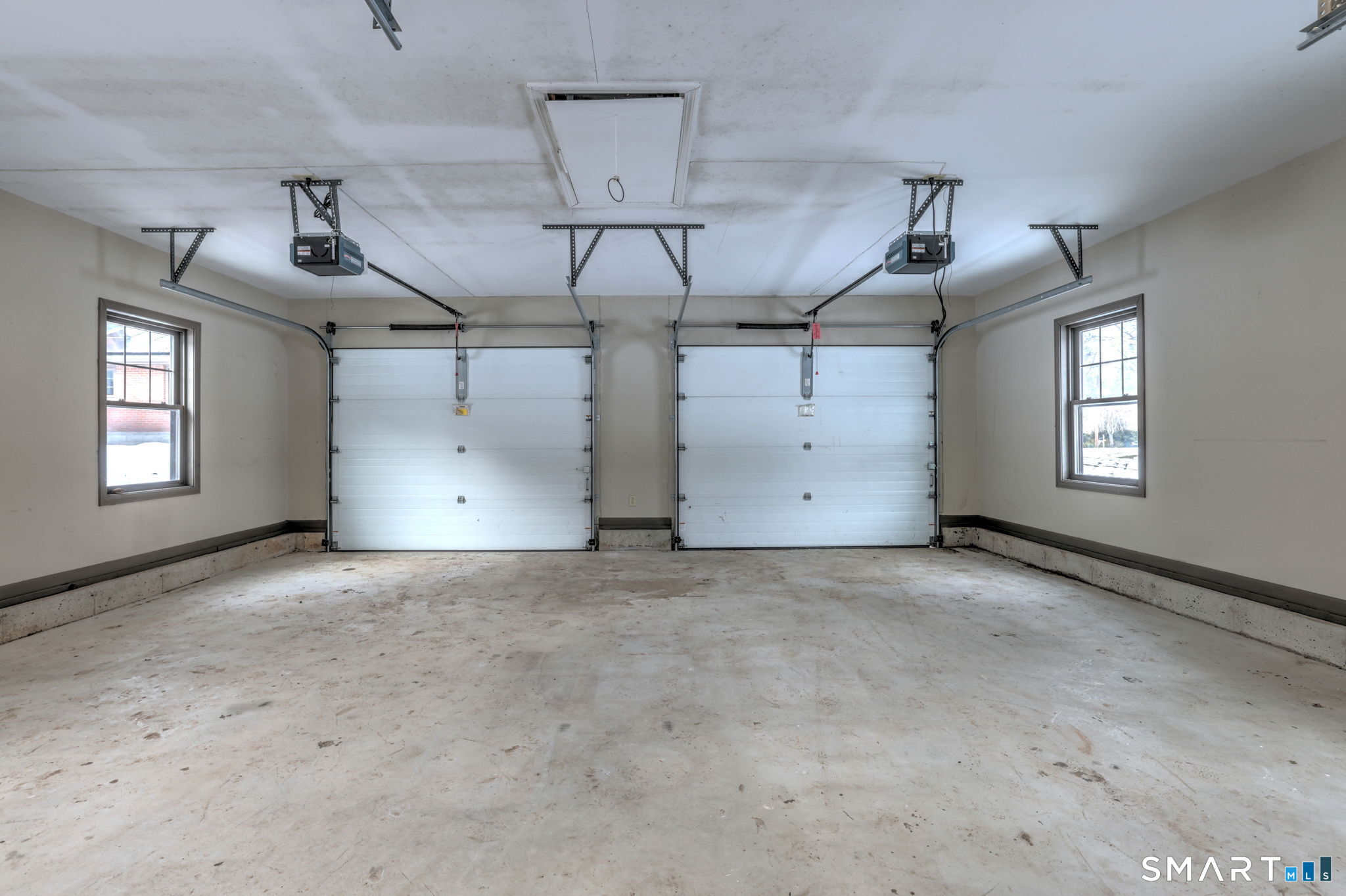 53 Geer Street Cromwell, CT 06416 - Photo 37 of 40 an empty room with windows and ceiling fan