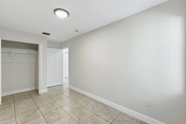 a view of an empty room with window