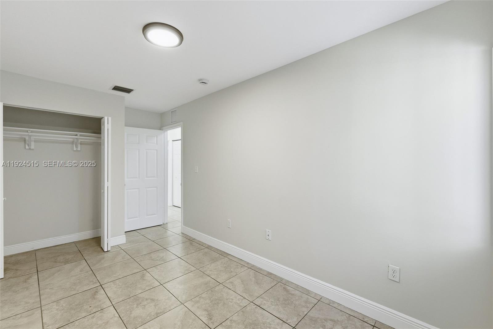 1977 Northwest 5th Place, Unit 408 Miami, FL 33136 - Photo 12 of 25 a view of an empty room